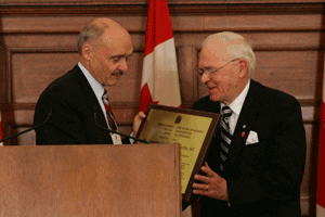 Doug Roche receives award
